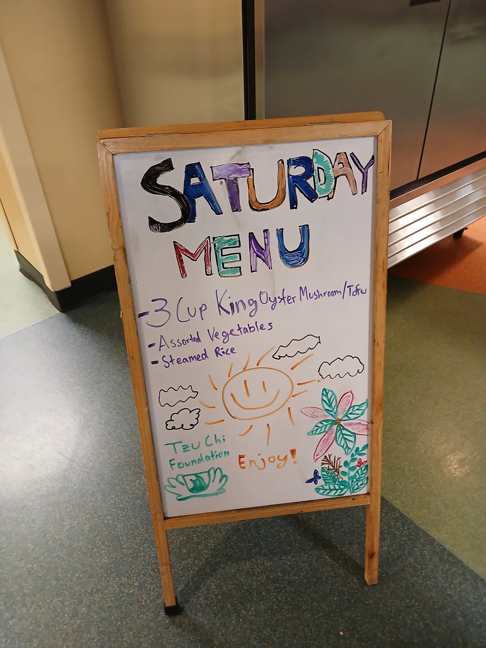 Saturday menu sign for a community meal